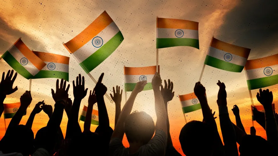 A picture of indian flag with a hand